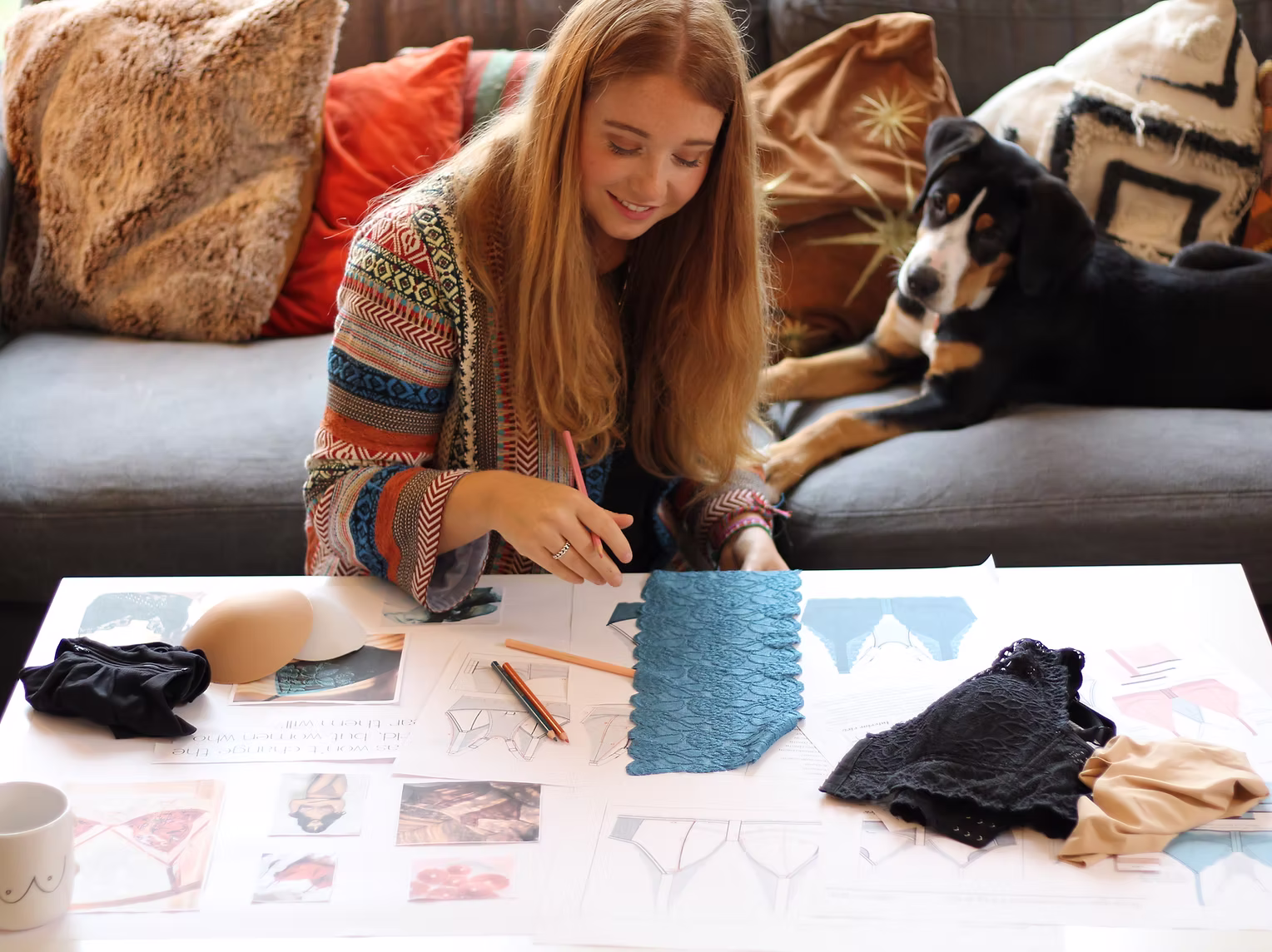 Brand owner reviewing Abraso’s design system created by The Aha Moment studio.