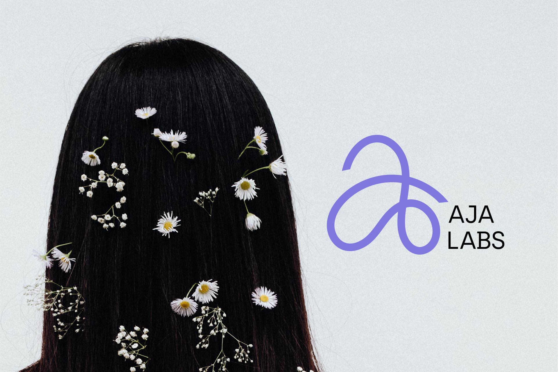 AJA Labs logo redesign with botanical hair imagery referencing plant-based biomimetic fiber innovation and heritage-inspired material identity