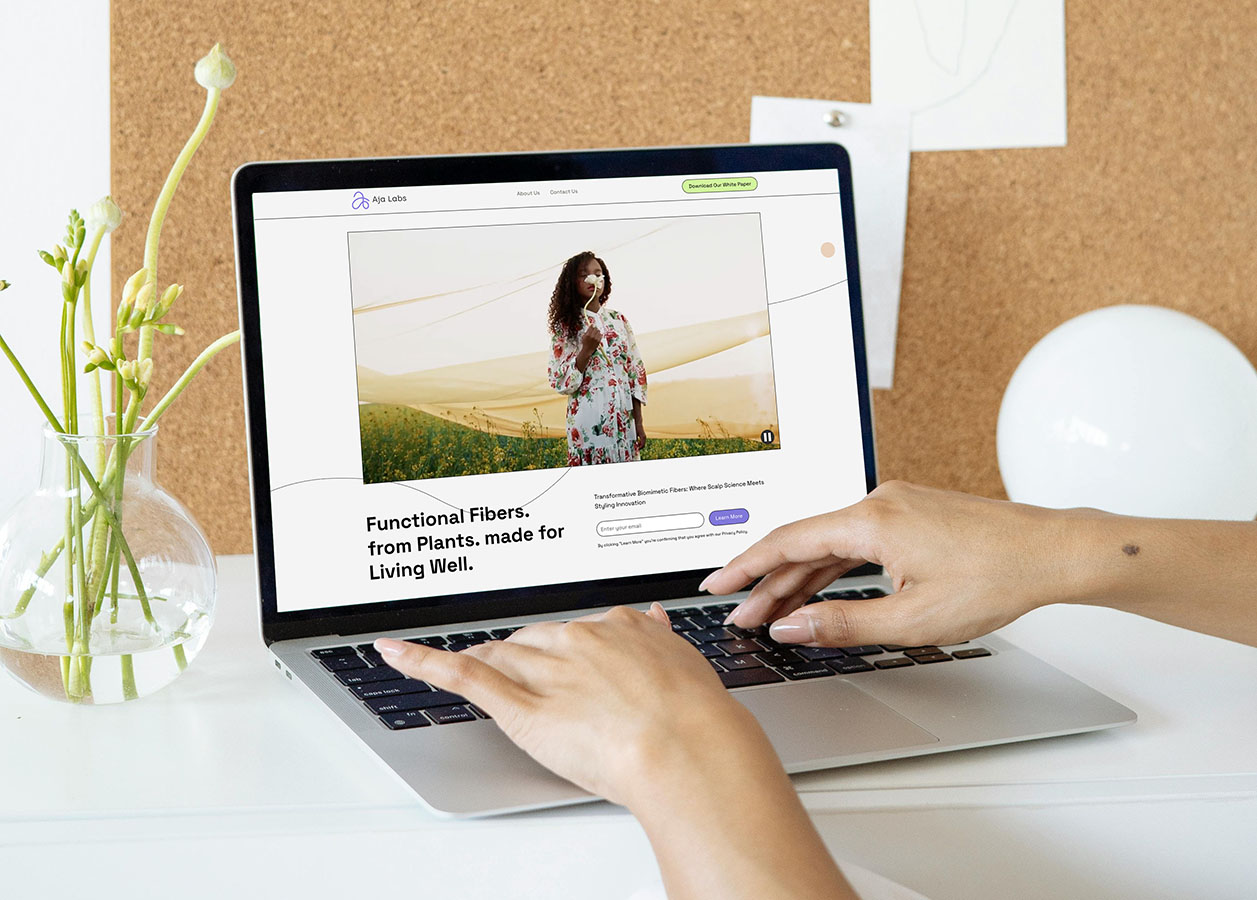 Website design for AJA Labs biomimetic fiber innovation brand identity supporting research communication and material development storytelling
